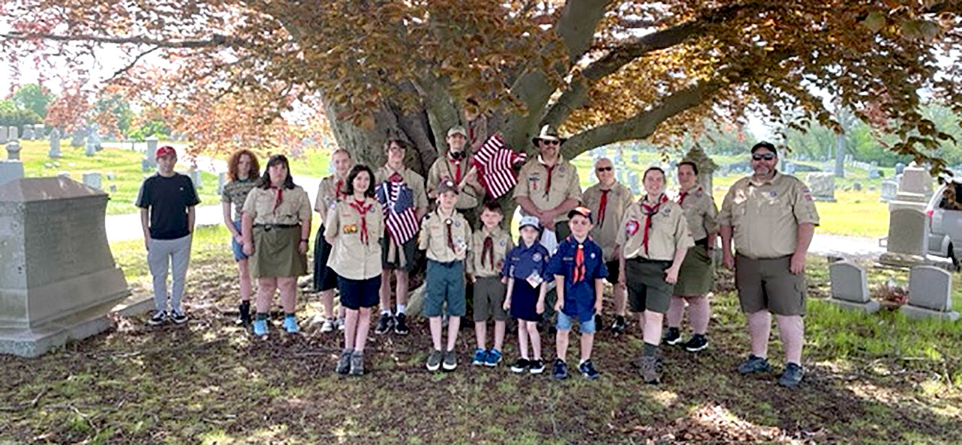 Scouts replace flags at Pawtucket cemetery
